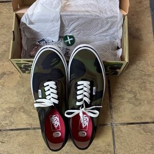 Vans Men’s Camo Canvas Sneakers in Olive and Black